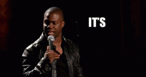 Comedian on stage reaction GIF
